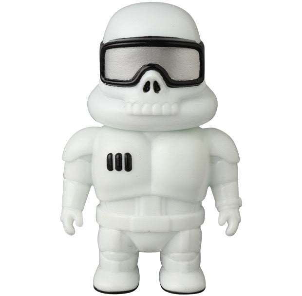 The Medicom VAG 45 – Space Controller is a unique Japanese vinyl gacha figure featuring a stylized stormtrooper design with a skull-like face, black goggles, and white armor, inspired by classic gachapon toys.