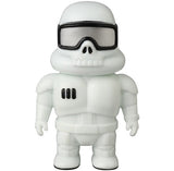 The Medicom VAG 45 – Space Controller is a unique Japanese vinyl gacha figure featuring a stylized stormtrooper design with a skull-like face, black goggles, and white armor, inspired by classic gachapon toys.