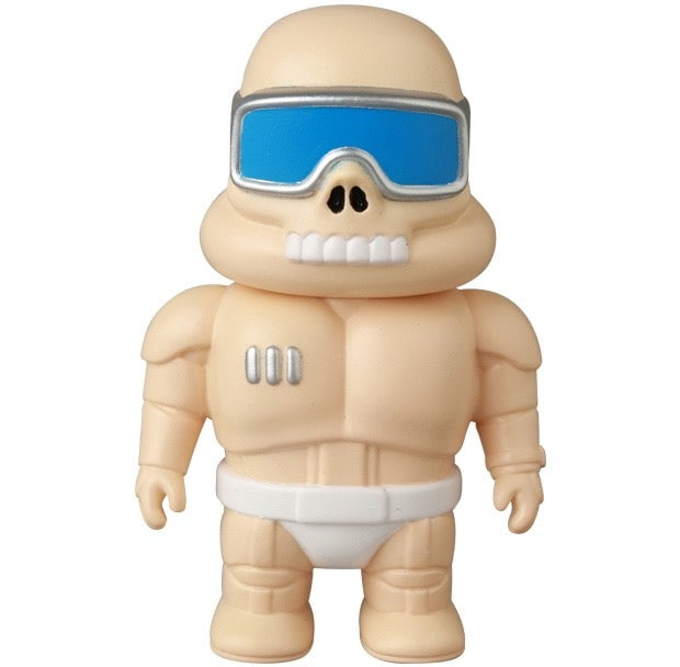 The Medicom VAG 45 — Space Controller is a Japanese vinyl toy featuring a skull-like face, blue goggles, and white briefs—ideal for fans of gachapon figures and Vinyl Artist Gacha collectibles.