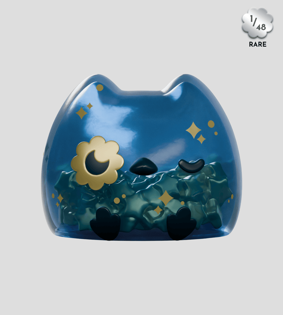 Kairos the Owl Blind Box by Kaleidos Creative features a blue owl-shaped figure with a translucent body, gold sparkles, black feet, and a flower detail—this rare 1/48 figure is revealed at random in each blind box.