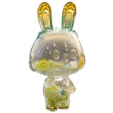 A transparent bunny-shaped figurine called Lemon Soda Robin by A Good Company, with yellow and green accents and bubble details inside—an eye-catching ornament or unique home decor piece.