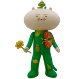 Meow Book - OG by The Little Hut is a quirky collectible cat man figure with a big head, green leaf suit, butterfly accent, and an all-seeing flower—perfect for unique display shelves.