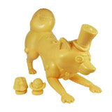 Mugi Teaworthy - Custard Cream by Lowbrowee Toys is a yellow plastic mech dog with a steampunk Victorian look, top hat, and four-leg stance. Comes with two interchangeable accessories.