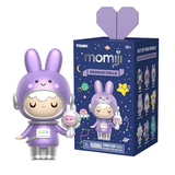 The Momiji Out of This World Message Dolls Blind Box features a purple, space-themed doll with bunny ears displayed next to its decorative box decorated with cosmic motifs and collectible doll illustrations.