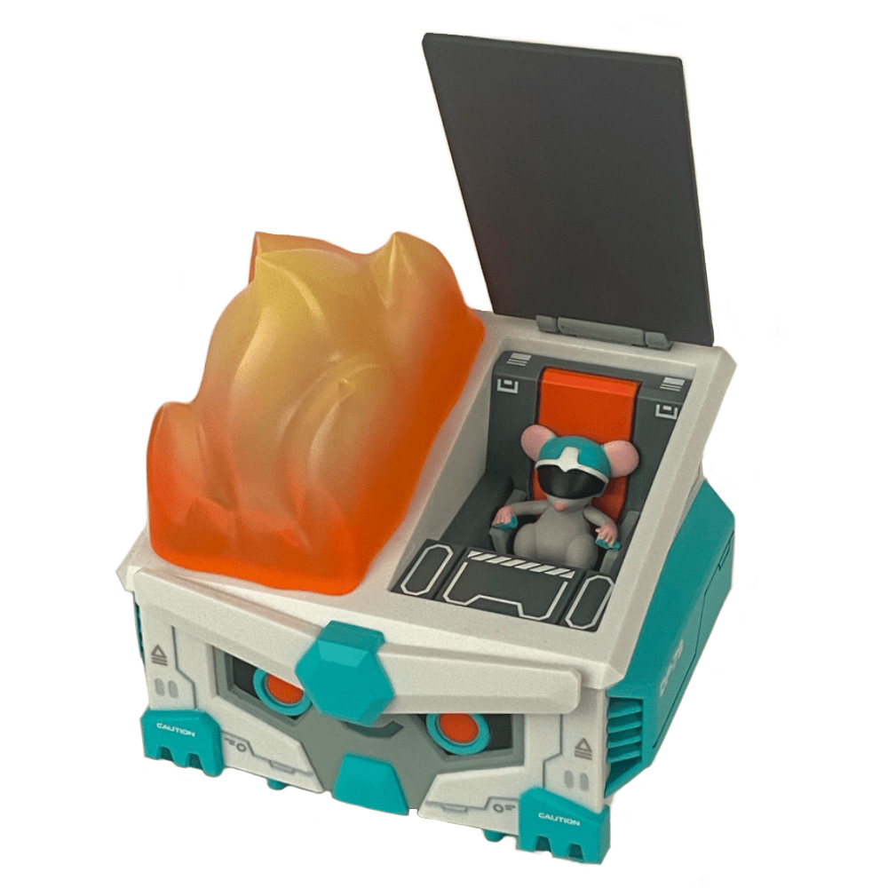 A small toy mouse in goggles sits inside the Mecha Dumpster Fire DF-79 by 100% Soft—a futuristic box with a magnetic hatch and large translucent orange flame on top—perfect for Gundam fans.
