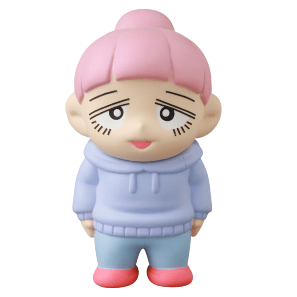 The Medicom Vag 35 - Inu No Kagayaki is a cartoon-style toy figure with pink hair, a purple hoodie, blue pants, and pink shoes—an amusing office gift and fun desk decor for adding quirky flair to any workspace.