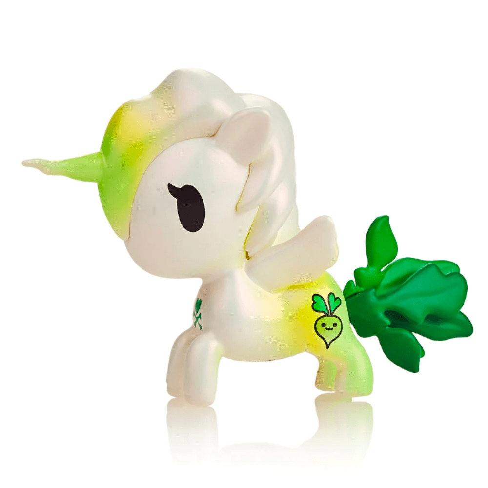 The tokidoki Veggie Unicorno - Daikon Special Edition Figure is a small white figurine with green accents, wings, a leafy tail, and a smiling radish graphic on its hind leg.