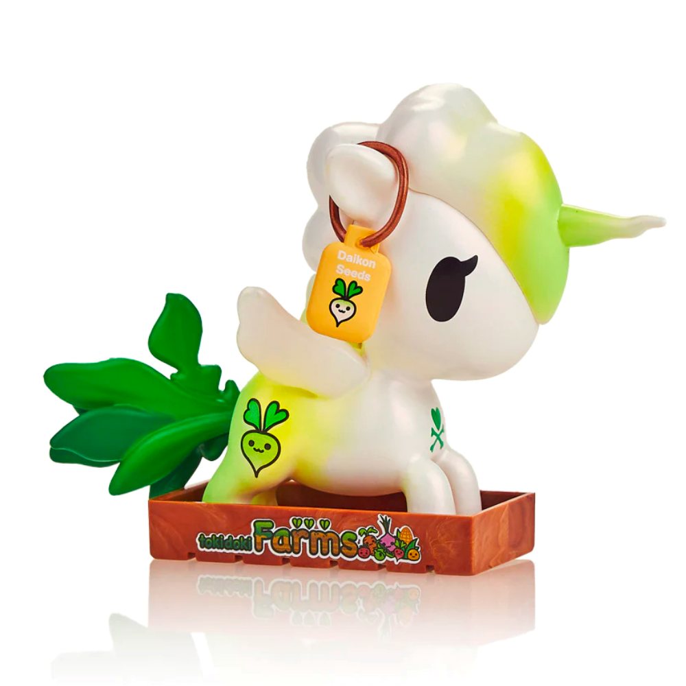 The tokidoki Veggie Unicorno - Daikon Special Edition Figure features leaf-like green details, a 