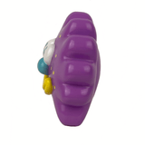 The Partner Toys Virus Flower is a 3.5-inch purple plastic toy shaped like a cartoonish clam, with blue, white, and yellow facial features and a charming flower detail.