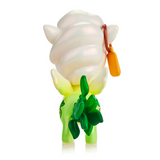 The tokidoki Veggie Unicorno - Daikon Special Edition Figure is a small green toy with leafy details, a large white daikon radish-inspired swirled head, and an orange tag, shown from the back on a white background.