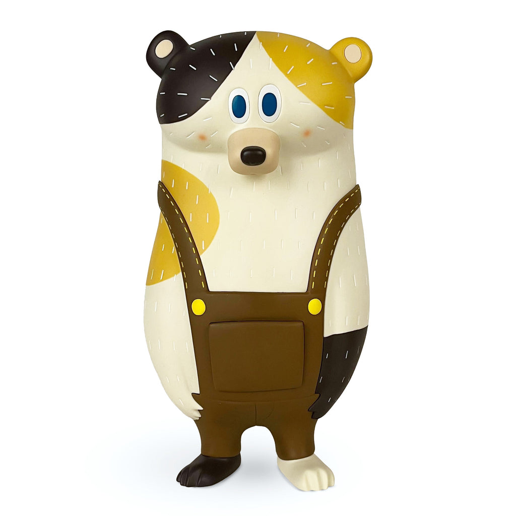 BG Bear — Calico by How2Work features a cartoon bear with blue eyes, brown and yellow patches, and brown overalls, standing upright against a white background.