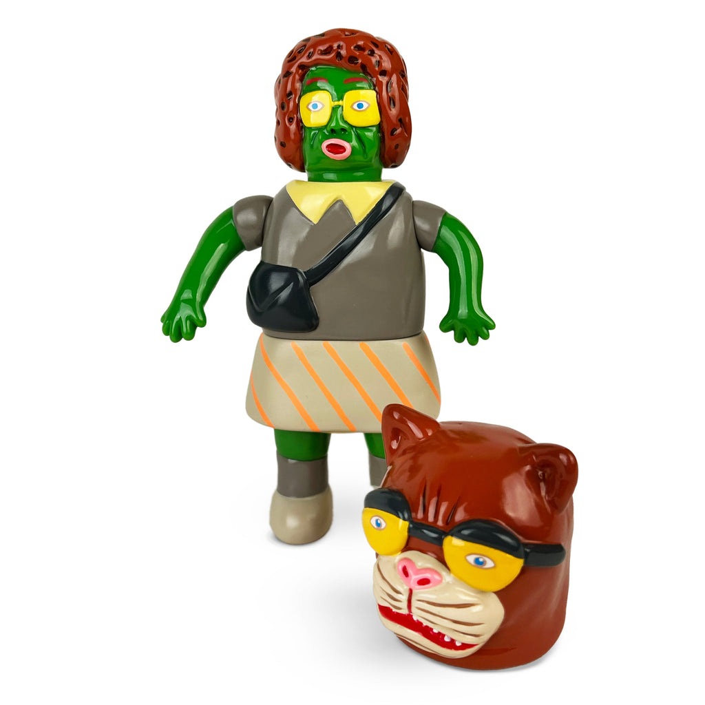 Paradise Toy's Koara Obasan — S2V3 - Puma features a green-skinned figure with brown hair, glasses, a skirt, and a shoulder bag, next to a separate red cat head with glasses.