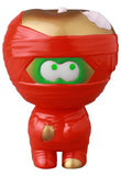 VAG 41 — Yummy Mummy by Medicom is a red vinyl toy figure with a green face, white eyes, and gold accents. This unique Japanese collectible from the Vinyl Artist Gacha series is perfect for fans of gachapon-style figures.