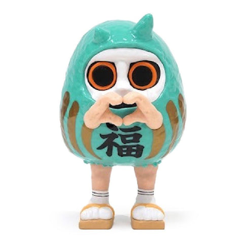 The How2Work Daruma is a small figurine with large round eyes, a green horned costume, and Japanese kanji on its body, standing and making a heart shape with its hands.