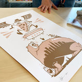 A hand rests on a table next to the “Abe Froman Sausage King Screen Print” by Jeremy Fish from Rotofugi, featuring a stylized bear, winged pizza slice, and abstract cityscape in brown and peach—an iconic Chicago art piece.
