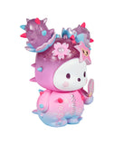 The tokidoki x Hello Kitty and Friends - Cherry Blossom Pochacco vinyl figure features a pink and blue gradient body, white face, spiked ears, floral details, and holds a mirror—a must-have collectible for fans.