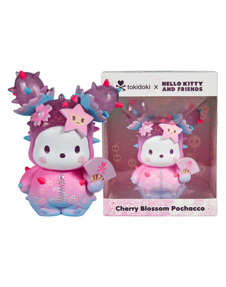 The tokidoki Cherry Blossom Pochacco, from the Tokidoki x Hello Kitty and Friends collection, features Pochacco in a pink cherry blossom outfit with purple spikes—an adorable must-have collectible for any fan.