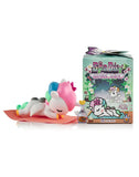 A small tokidoki unicorn figurine with a towel and eye mask rests on a mat beside the Spa Day Unicorno Blind Box, capturing kawaii wellness in this adorable collectible.