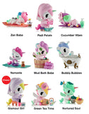 The tokidoki Spa Day Unicorno Blind Box features nine kawaii wellness-themed figures—like Zen Babe, Pedi Petals, and Cucumber Vibes—displayed in three rows. Enjoy collecting each adorable Unicorno surprise!.
