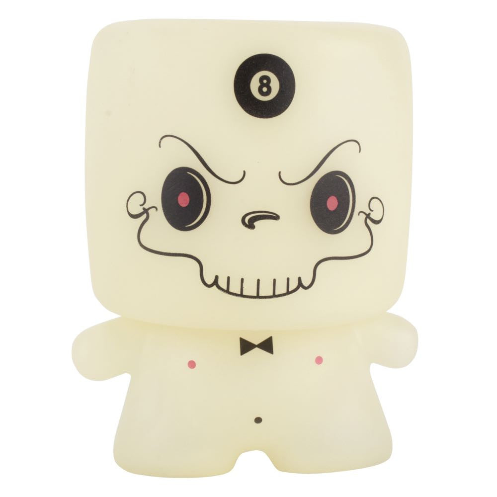 Grim Marshall by 64 Colors (Squibbles Ink + Rotofugi) is a limited edition figure featuring a square skull-like head, black bow tie, number 8 on its forehead, and glowing pink dots on its chest—like a marshmallow.