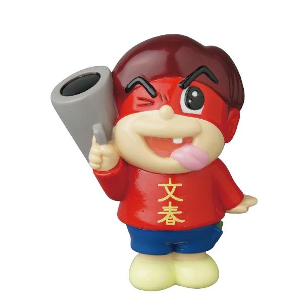 Medicom Vinyl Artist Gacha Series 13 - Fumharu Kun: a collectible figure of a winking child in a red shirt with yellow Chinese characters, blue shorts, yellow shoes, holding a gray object and sticking out their tongue.