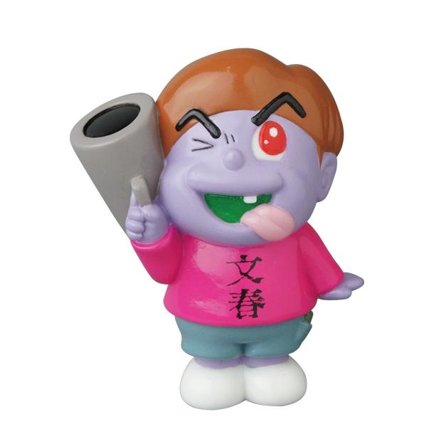 Purple cartoon figure with brown hair, winking and sticking out its tongue, wearing a pink shirt with black characters and blue shorts, holding a gray object—Medicom's Vinyl Artist Gacha Series 13: Fumharu Kun collectible.