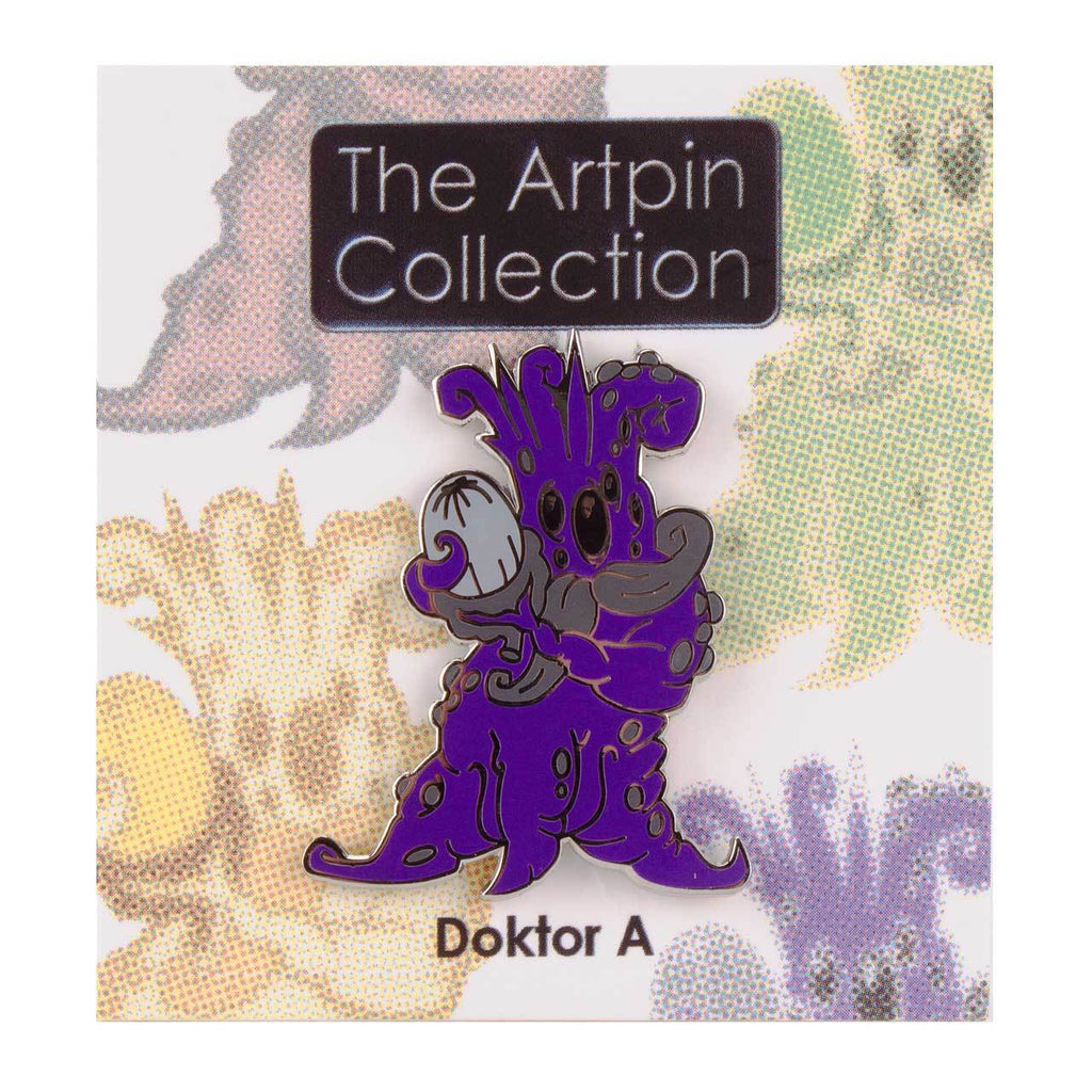 A whimsical Mandrake Root pin by Doktor A from The Artpin Collection is displayed on a branded backing card, perfect for folk tale pin enthusiasts and lovers of unique accessories.