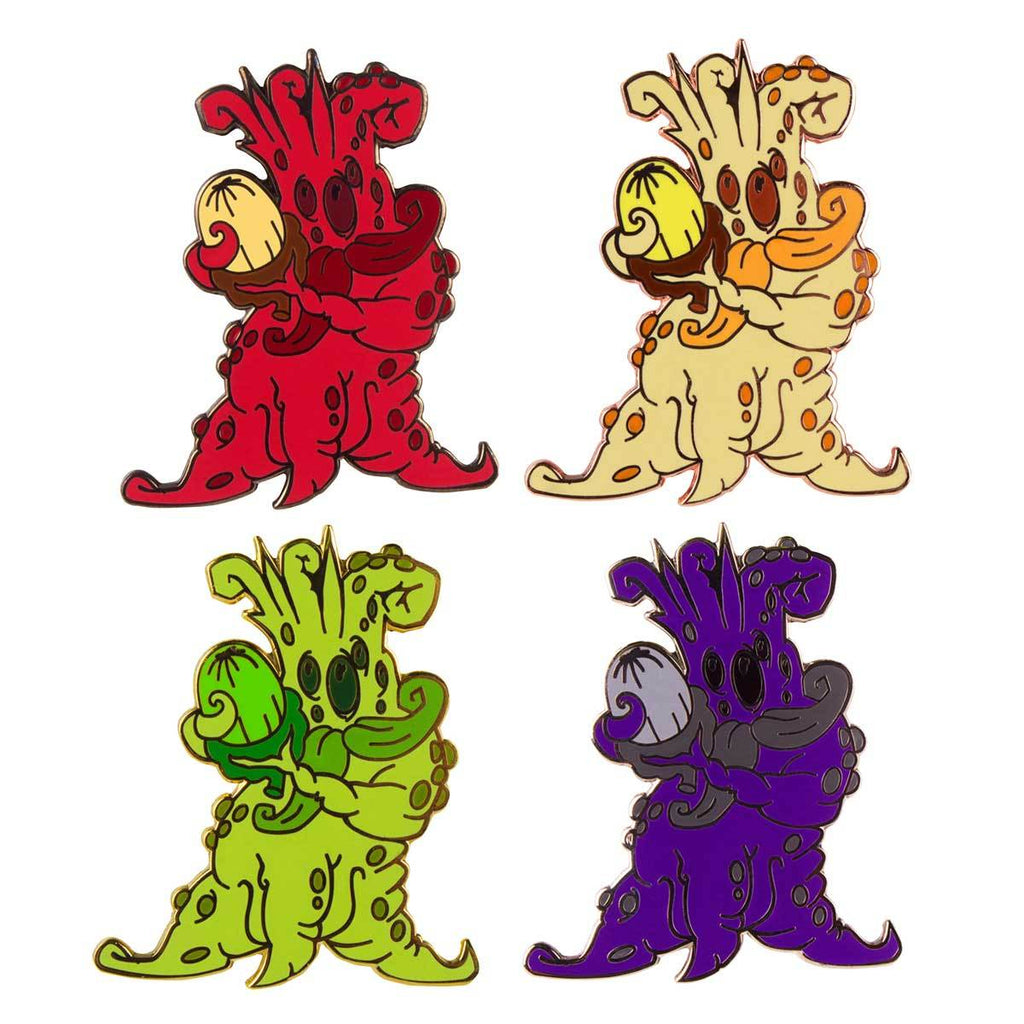 Four cartoonish, octopus-like creatures in red, beige, green, and purple hold a spotted egg in each version—a whimsical Mandrake Root collectible by Doktor A for The Artpin Collection.