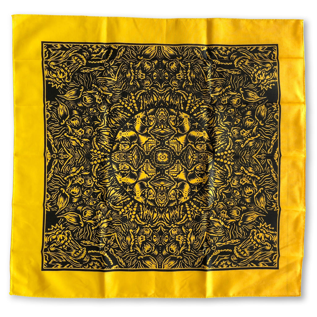 The Cherry Moth Cake Bandana by Cherry Moth Cake features a square yellow fabric with an intricate black symmetrical pattern of abstract shapes and organic motifs, framed with a bold black border.