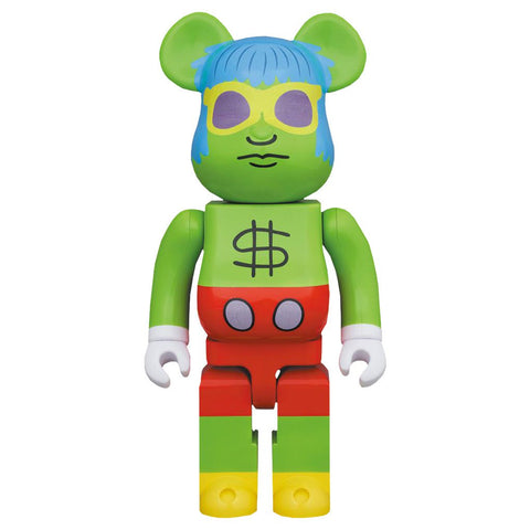 The Medicom Keith Haring — Andy Mouse 1000% Be@rbrick is a pop art collectible featuring a green face, blue hair, sunglasses, dollar sign chest, red shorts, and yellow feet, reflecting Keith Haring’s iconic playful style.