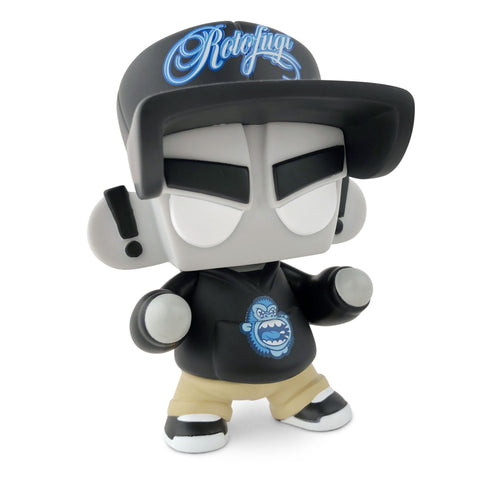 The UVD Toys Mad*L Citizen — Rotofugi Mad Ape is a limited edition designer toy featuring a black cap with "Rotofig," black hoodie with blue graphic, tan pants, and black-and-white sneakers.