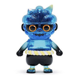 Oniki — Clear Blue by How2Work is a blue translucent sofubi vinyl toy inspired by Japanese yokai, featuring large round eyes, black glasses, a rope belt, black gloves, and black shorts in an upright pose.